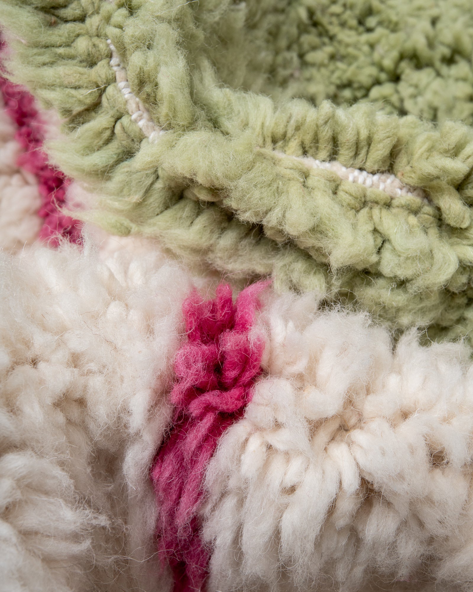 Modern, designer, handcrafted Berber rug from Morocco. Beniourain carpet with beautiful colours and patterns and fluffy wool texture.